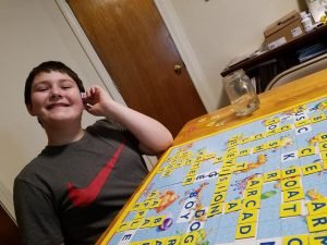 Jacob playing Scrabble