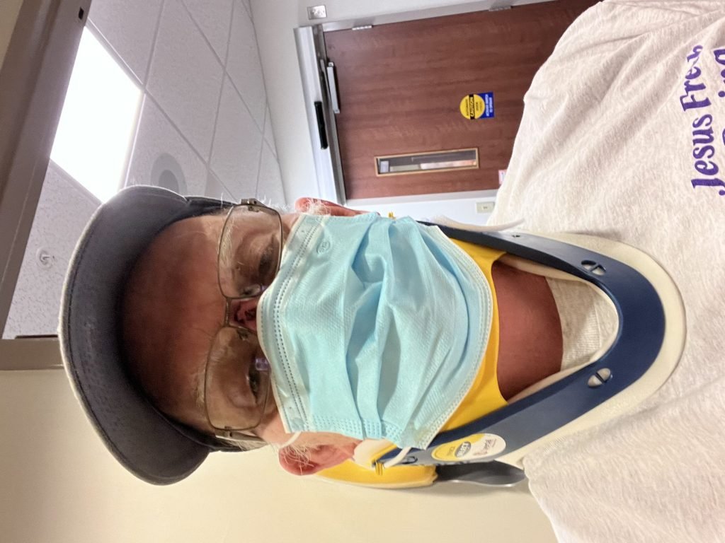 Lee with cervical collar