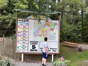 Jacob in front of the campground map