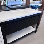 White stone top vanity at Poshhaus in Keene