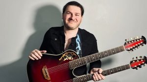 Adam Colagrossi, teacher by day, rocker by night.