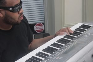 Keyboardist Marcus McPherson of Cosmic Error.