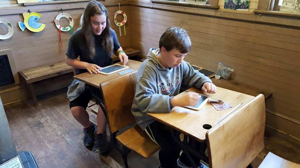 Jordan and Mariah in schoolhouse at the Adirondack Museum in Blue Mountain, New York