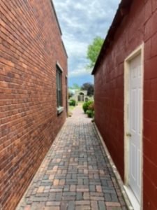Brick walkway between buildings
