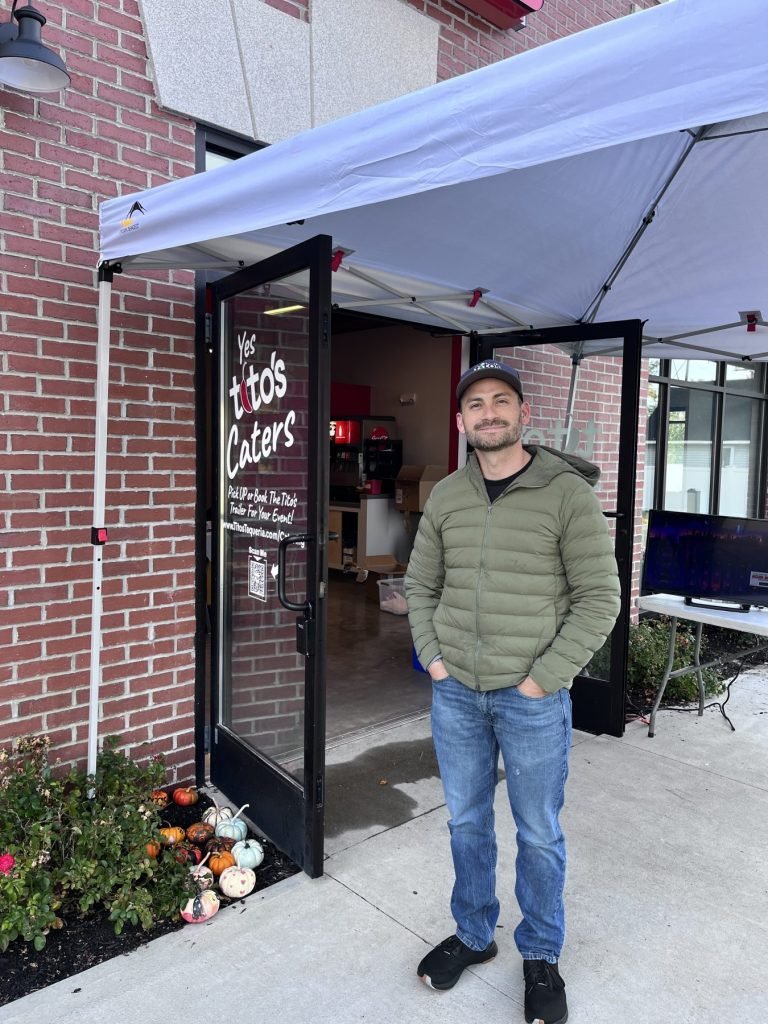 Tito of Tito's Taqueria standing in front of his newest restaurant in Keene, NH
