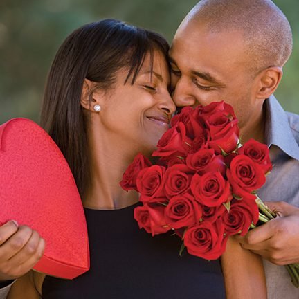 Couple with roses and candy
