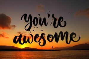 you are awesome quote on beautiful beach background