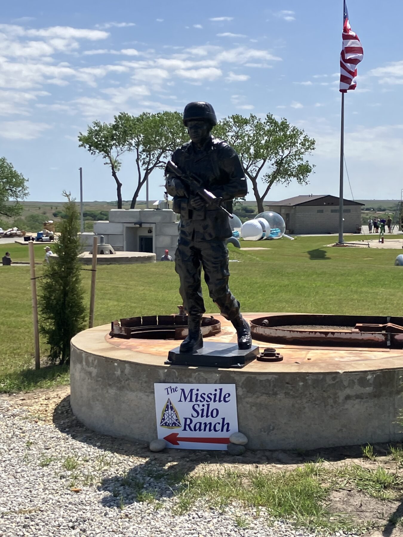 Soldier statue and the gate of the Missile Silo Ranch