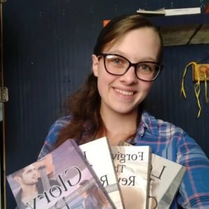 Kaily Keyes Holding her books