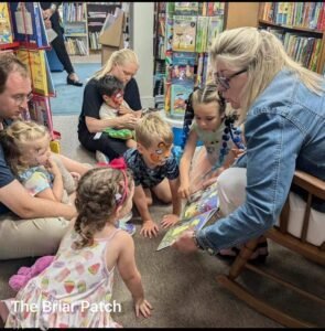 The Briar Patch Children being read to