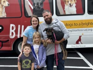   A happy family has found their perfect pup to adopt through Dog Star!